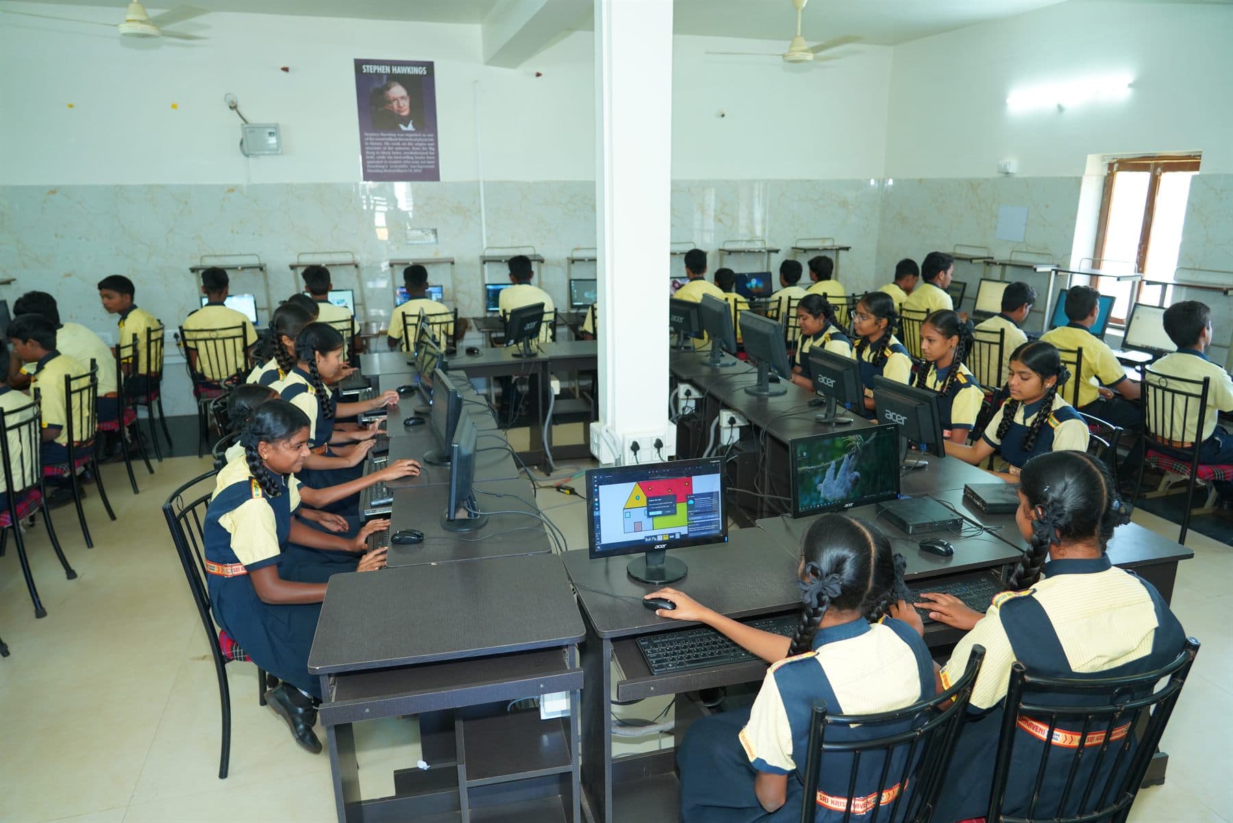 Students working in the spacious computer laboratory