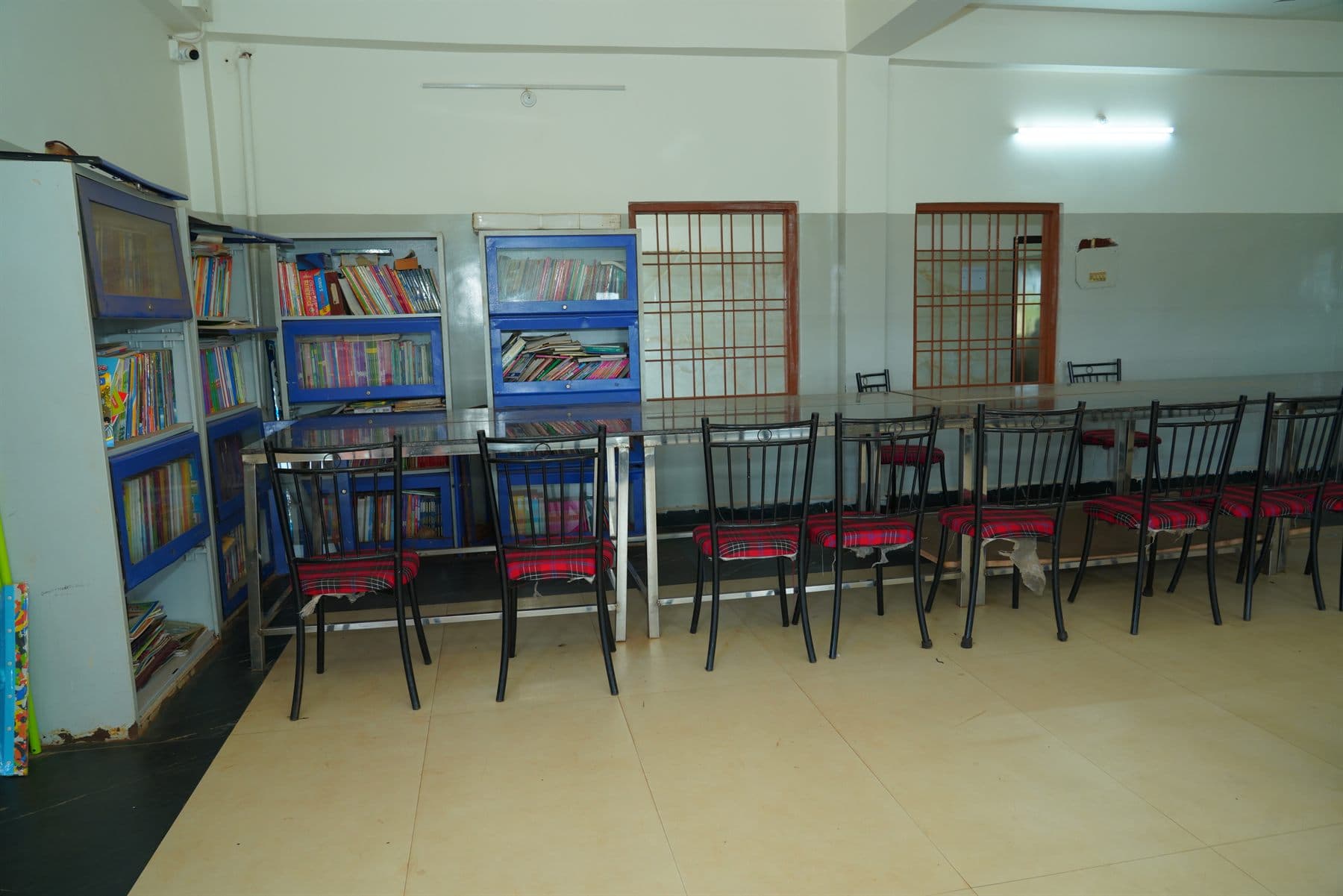 School library with bookshelves and reading tables